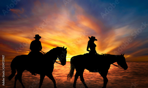 Fototapeta Naklejka Na Ścianę i Meble -  cowboy riding on the beach
