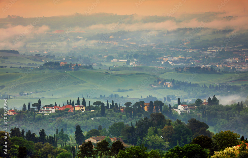 Foggy landscape in Tuscany, Italy, Europe
