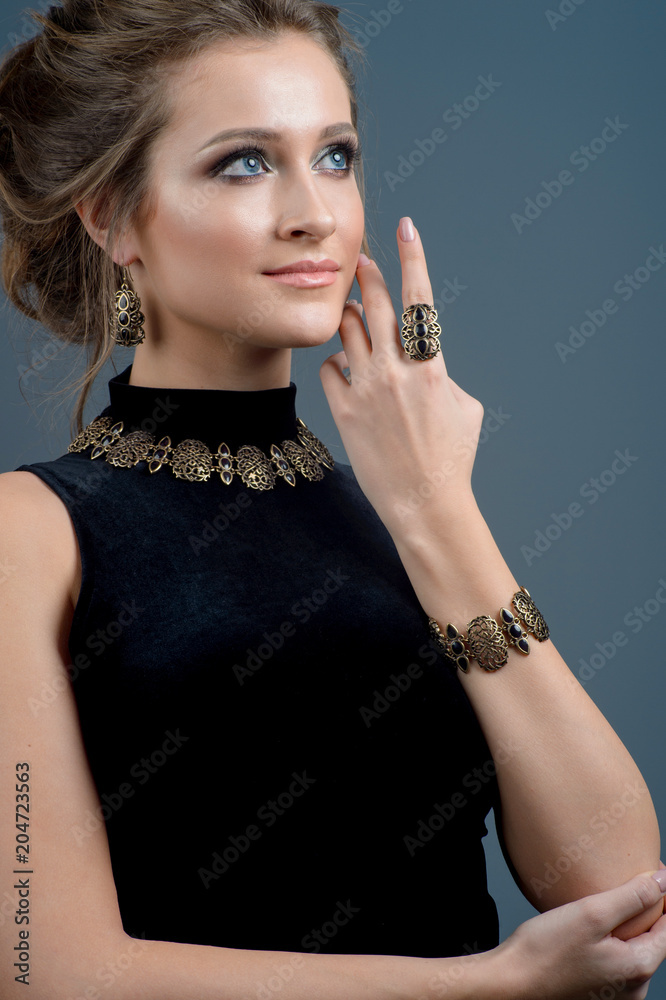 Obraz premium girl with jewelry. A set of jewelry for woman ,necklace ,earrings and bracelet. Beauty and accessories.