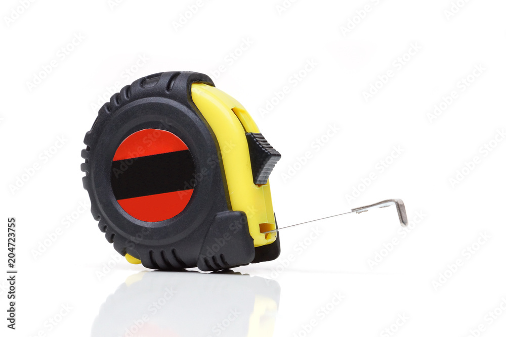 Naklejka premium A tape measure / Measuring tape isolated on white