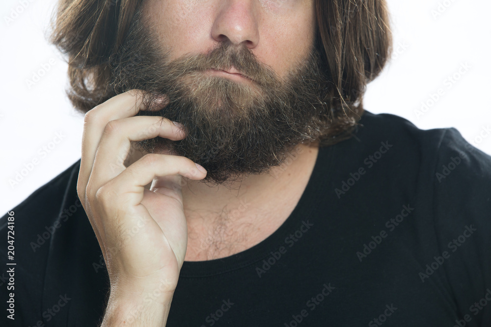 Fototapeta premium Closeup to mature man scratching beard, thoughtful gesture itchy beard