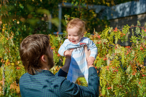 Father holds baby