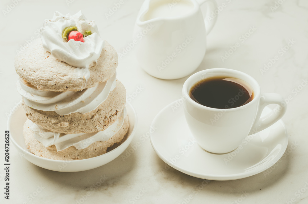 Espresso white cup with dessert and milk/Espresso white cup with dessert and milk on white marble background Espresso white cup with dessert and milk/Espresso white cup with dessert and milk on white marble background