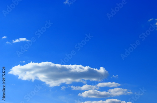 Flat clouds on blue sky background