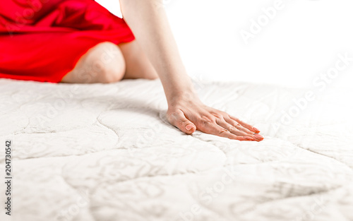 woman on a soft mattress