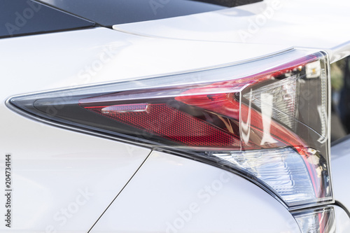 Close- up white car and Tail light