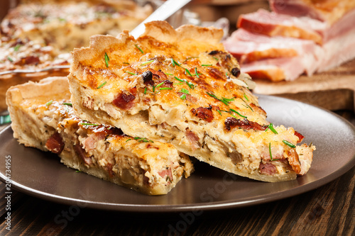 Pieces of quiche lorraine with bacon and cheese