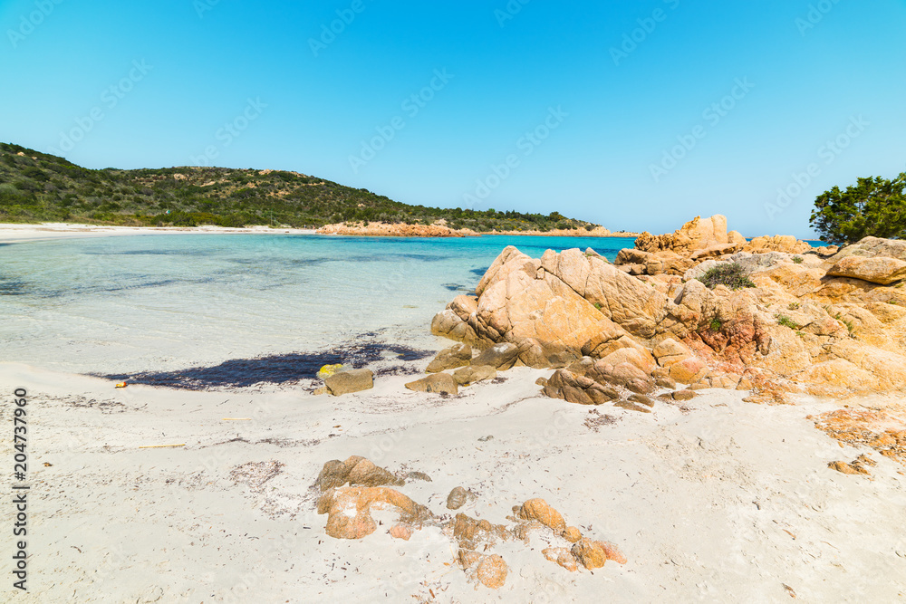 white sand and rocks in Spiaggia del Principe white sand and rocks in Spiaggia del Principe