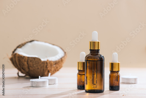 Healthy skincare. Pure coconut oil is made from organic coconut on wooden background