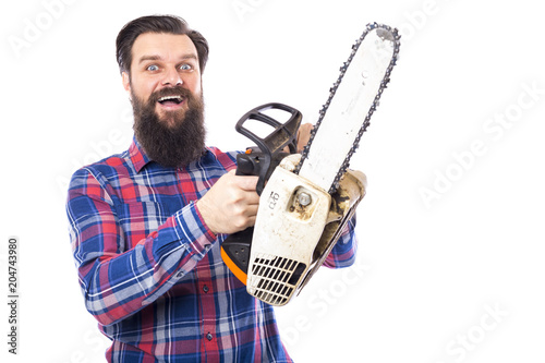 Bearded man holding a chainsaw isolated on a white background