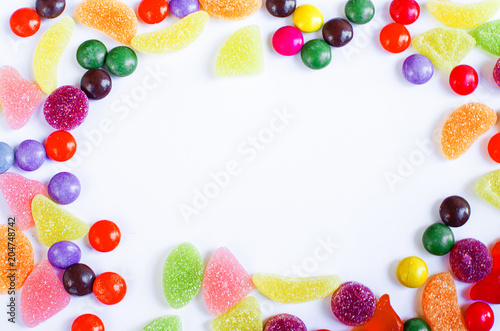 Scattered colored candy on a limited