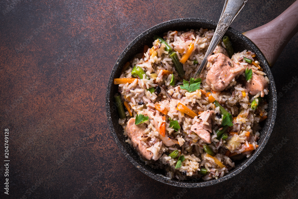 Pilaf with turkey meat and brown rice.