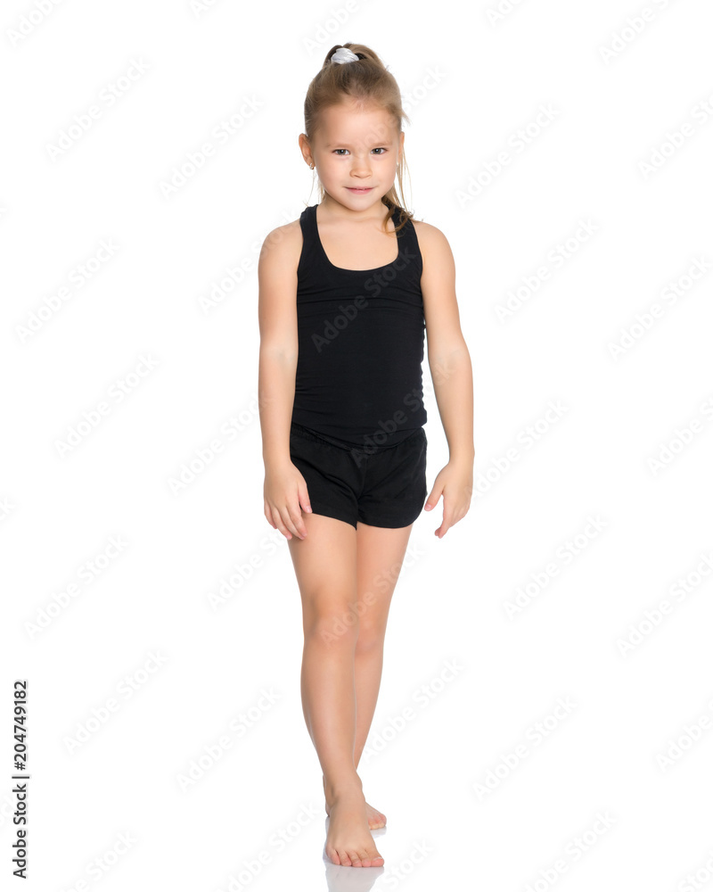 The gymnast prepares to perform the exercise. The gymnast prepares to perform the exercise.