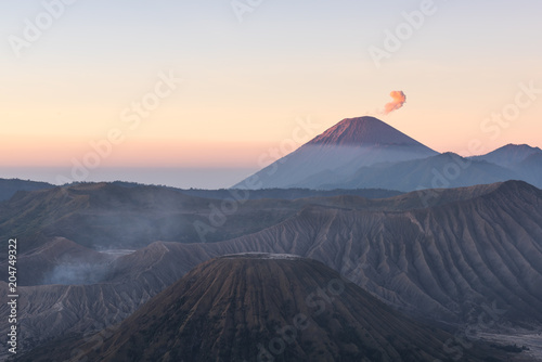 Mount Bromo volcano (Gunung Bromo) during colorful sunrise from viewpoint on Mount Penanjakan in Bromo Tengger Semeru National Park, East Java, Indonesia