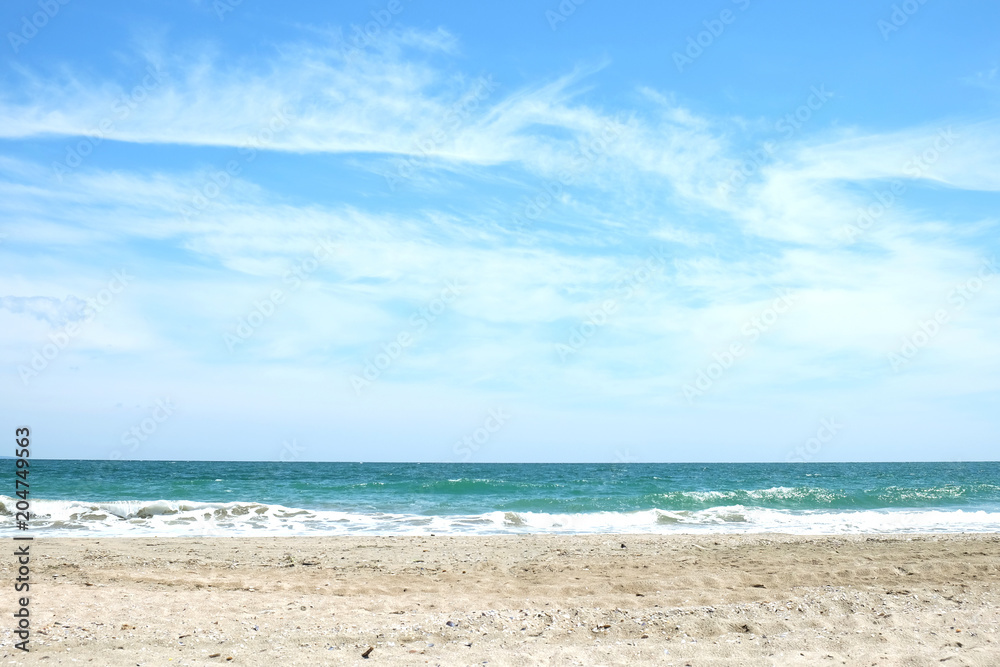Beach and sea in bright sunlight