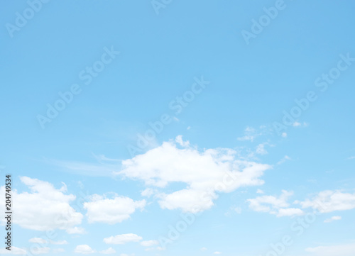 Blue sky filled with fluffy white clouds