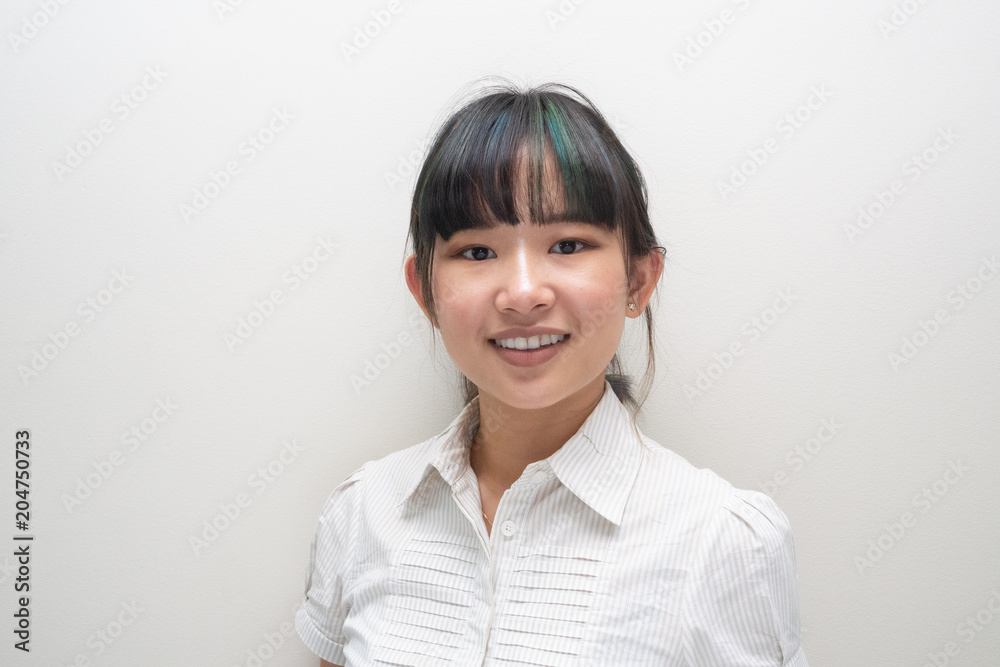Portrait of young asian woman with green and blue hair Portrait of young asian woman with green and blue hair