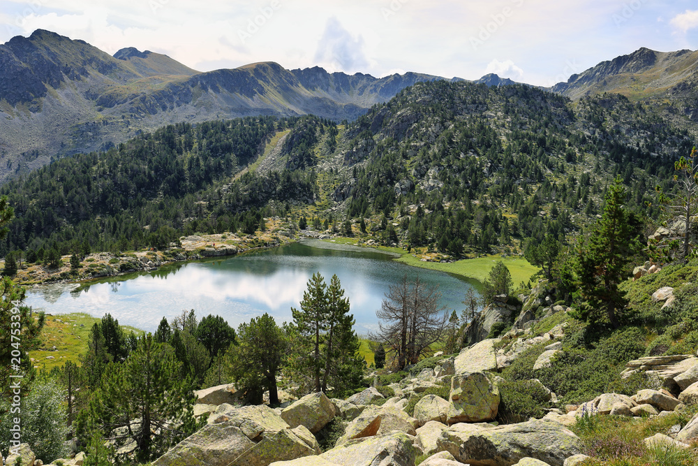 Reflection at the first lake in the circuit of Lake Pessons, Andorra