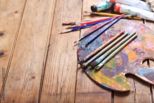 paint brushes on a palette