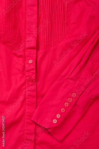 Close up female elegant red shirt. Detail of women cotton blouse. Feminine fashion outfit.