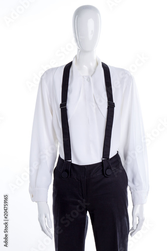 Wallpaper Mural Female white blouse and black trousers. Black trousers with suspenders on female mannequin. Female classic fashion. Torontodigital.ca