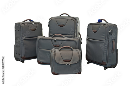 Travel luggage set with airplane in background
