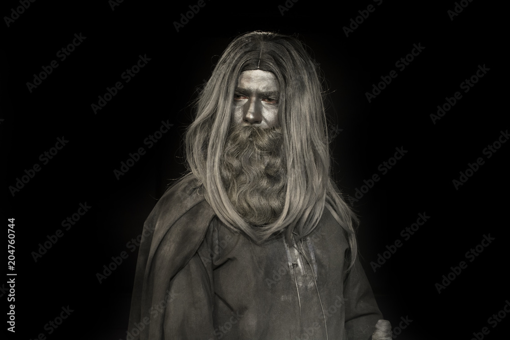 long haired man made of gray make up; mythological bearded man long haired man made of gray make up; mythological bearded man