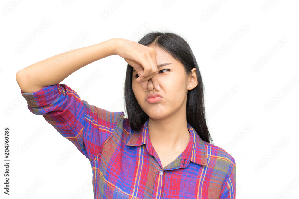 Portrait of frustrated woman pinching nose with disgust on his face due to bad smell isolated over white background Portrait of frustrated woman pinching nose with disgust on his face due to bad smell isolated over white background