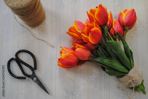 Bouquet of tulips and scissors