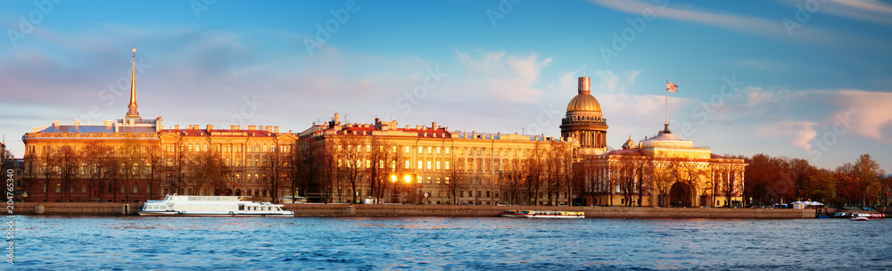 View to Saint Petersburg in the evening. City panorama at sunset with Isaac cathedral and Admiralty