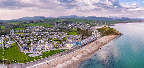 The Skyline of Criccieth and beach after sunset, Wales, UK photo