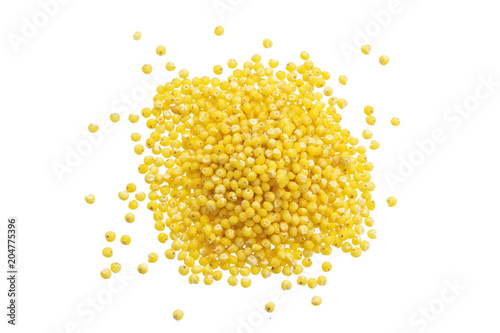 Heap of millet isolated on white background. Top view