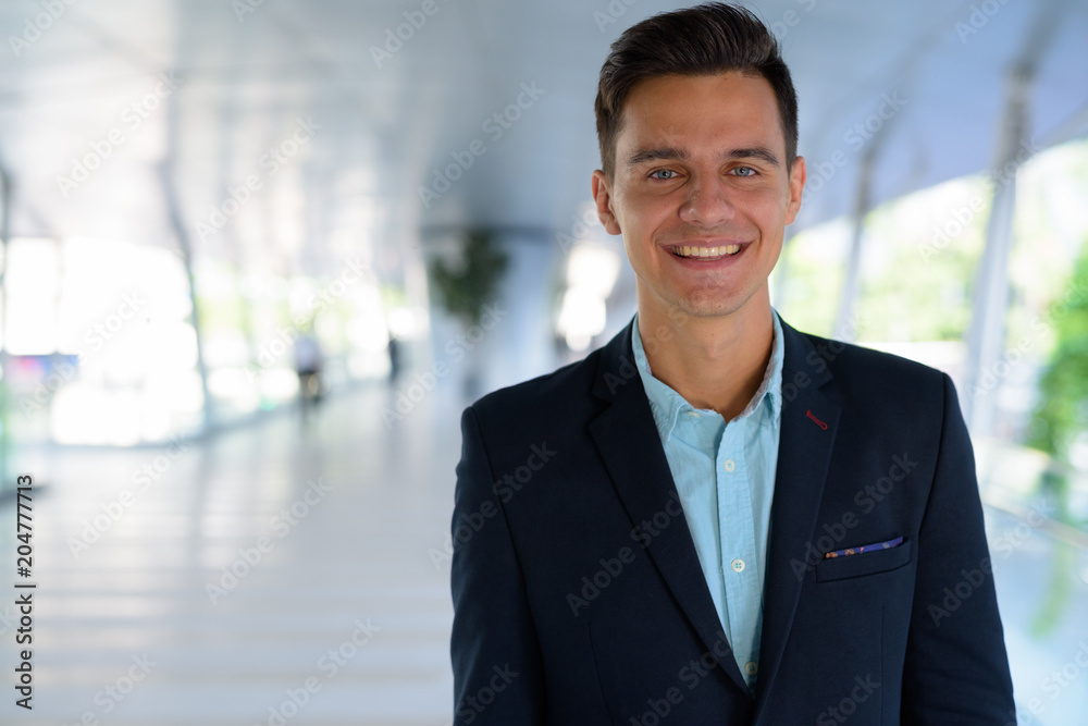 Young handsome businessman exploring the city Young handsome businessman exploring the city