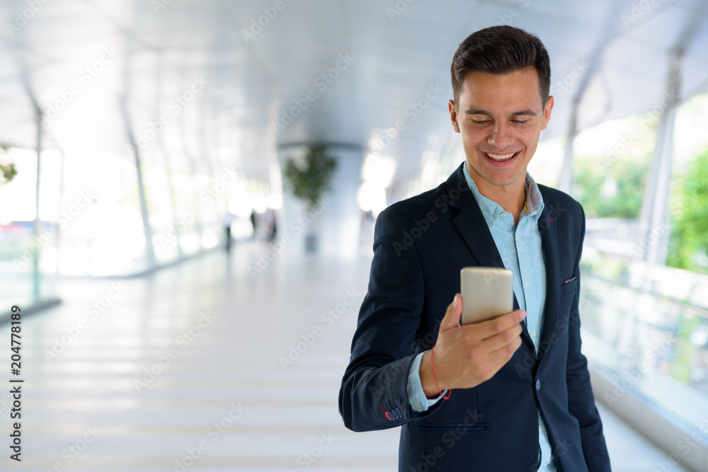 Young handsome businessman exploring the city Young handsome businessman exploring the city