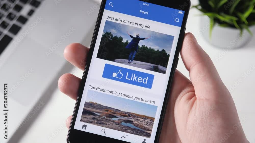 Pressing like button on social media on social media app