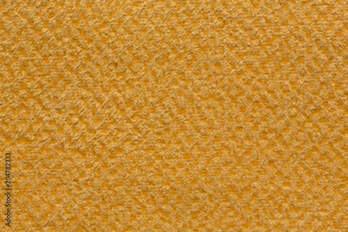 Fabric background in yellow colour.