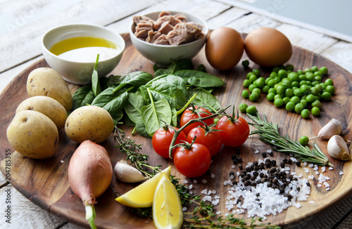 Ingredients. Tuna salad with lettuce, eggs and tomatoes.