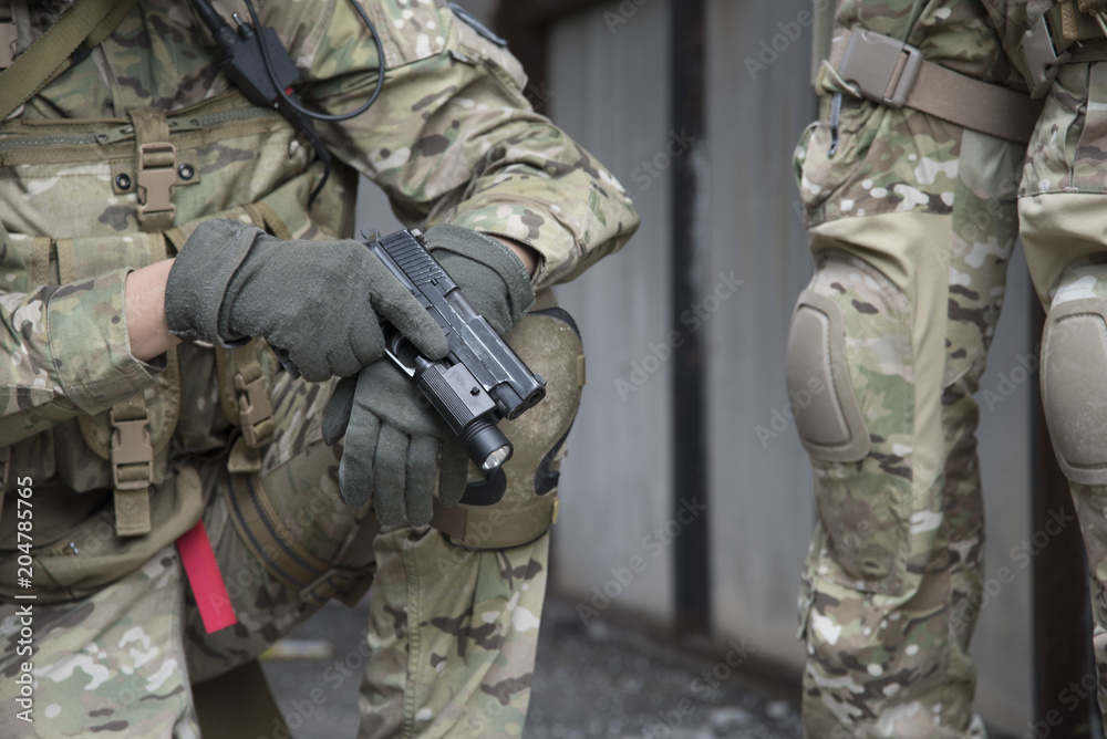 Military uniform and weapons