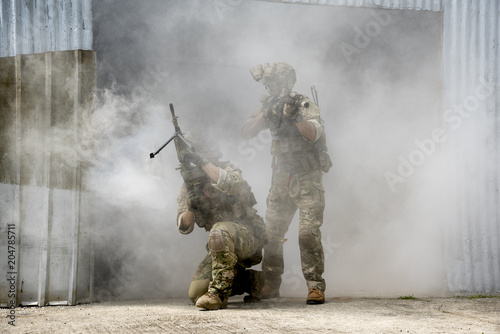 Soldiers with smoke on a wallpaper