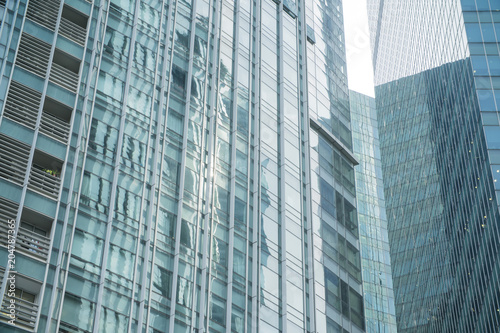 close-up of window walls skyscrapers background