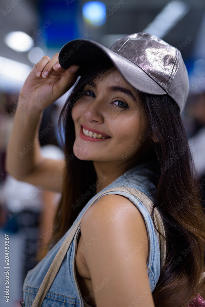 Young beautiful Asian tourist woman exploring the city of Bangko Young beautiful Asian tourist woman exploring the city of Bangko