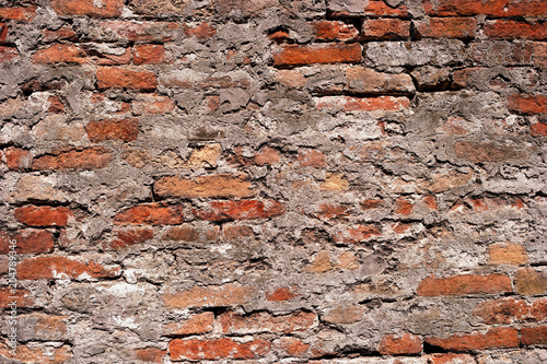 Old brick wall with white and red bricks background.