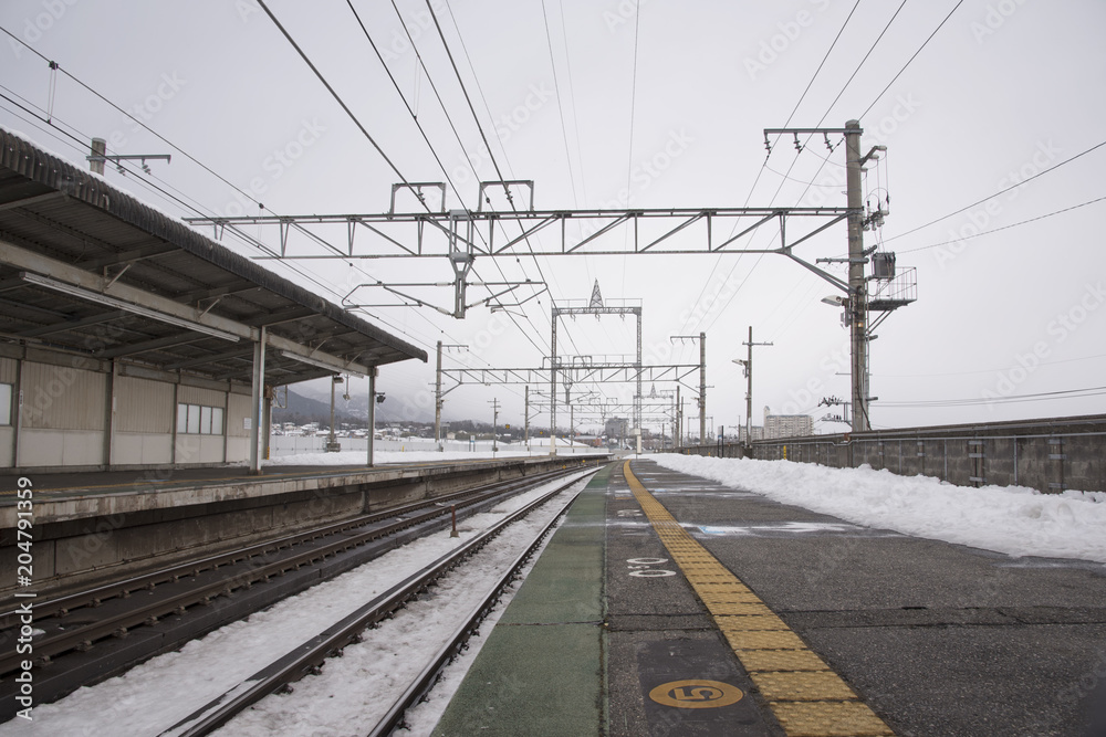 Snow-capped train station in winter
