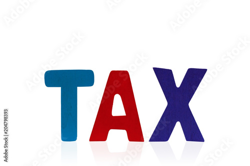 TAX wooden word on white ba...