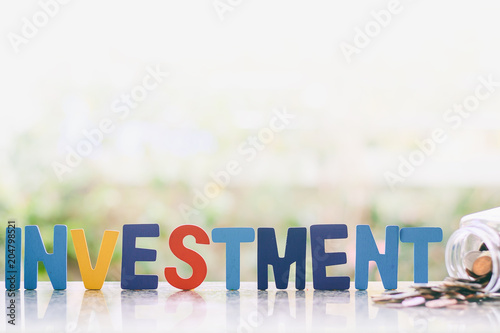 Investment wooden word with...