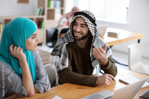 Muslim students wearing tra...