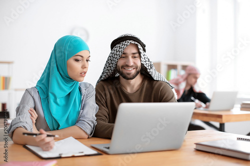 Muslim students wearing tra...