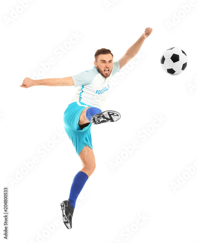 Young man playing football on white background
