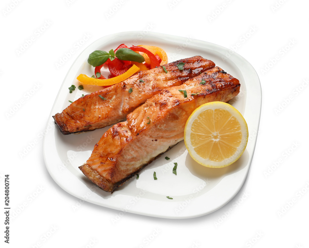 Plate with tasty cooked salmon on white background Plate with tasty cooked salmon on white background