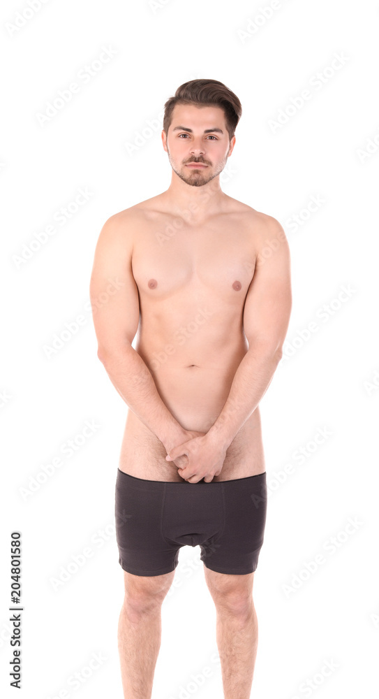 Young man with urological problems on white background